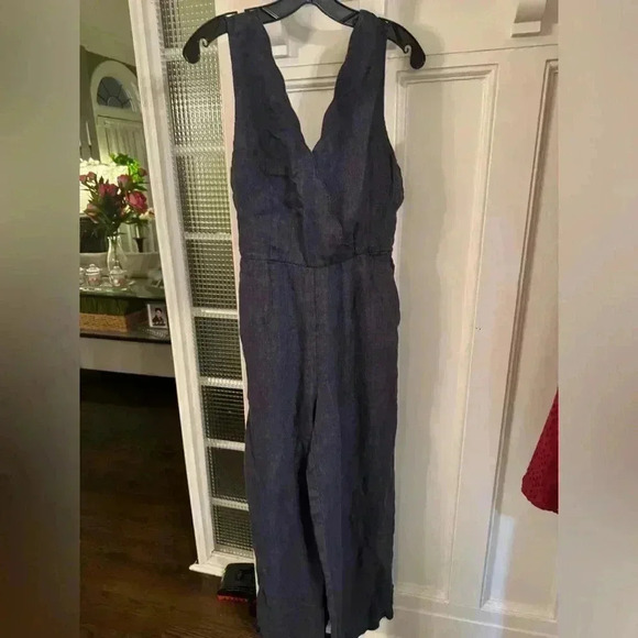 Nicole miller 100% linen blue jumpsuit with tie belt. zip up back wide leg.